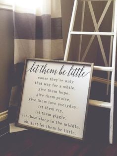 a wooden ladder next to a sign that says, let them be little except they're only