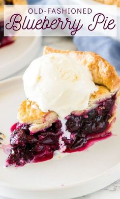 a slice of blueberry pie with ice cream on top