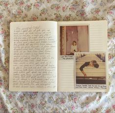 an open book with pictures and writing on the pages, sitting on a floral bed spread