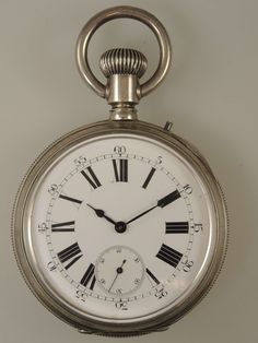 "This is a huge silver pocket watch made in Switzerland circa 1890 The watch is much bigger than usual and measures 112mm long from the bow to the opposite edge x 74mm wide x 23mm deep. I have taken an image of the watch next to a regular 50mm watch / 16 size watch as comparison Movement - the attractive nickel ¾ plate movement is much larger than usual and has a lever escapement and is decorated with unusual frosted damascening. The movement is in 95% mint condition - superb condition Case - th Silver Timeless Pocket Watch With Stopwatch, Timeless Silver Pocket Watch With Stopwatch Feature, Plate Movement, Vintage Clocks, Clock Repair, Silver Pocket Watch, Sun Sets, Pocket Watches, Blue Steel