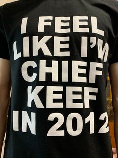 a man wearing a t - shirt that says i feel like i'm chief keep in 2012