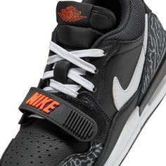 SHOUT-OUT TO THE 312. The Air Jordan Legacy 312 celebrates MJ's legacy with this shout-out to Chicago's 312 area code. The design creates a modern mash-up of iconic Jordan elements. Design combines iconic Air Jordan elements from the AJ3, AJ1, and Alpha Force. Leather, synthetic and/or textile upper adds a midfoot strap for a secure fit. Visible Air-Sole unit in the heel provides responsive cushioning. Air Jordan Legacy 312 Low, Jordan Legacy 312, Instagram Cartoon, Black Cement, Area Codes, Black Wolf, Kids Jordans, Jordan 3, Jd Sports