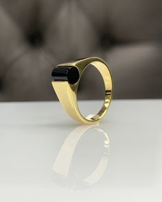 Onyx Men Ring, Blue Pinky Ring, Cylinder Genuine Gemstone, Stylish Gold Silver Ring, Handmade Jewelry, Best Gift for Him ◎ Details ◎ ○ Material 14K Solid Gold or 925 Sterling Silver Weight of Ring : approx 7.00 gr Height of Ring : approx 6.15 mm Width of Band : approx 6.80 mm ○ Upgrade to Solid 18K Gold, please click the link below: https://www.etsy.com/listing/962826004 ○ Gemstone Natural Onyx Stone approx. 6.80 mm x 6 mm approx. 1 ct Made to Order HANDMADE ITEM ○ For Men Collection : https://e Onyx Signet Ring, Best Gifts For Her, Men Ring, Ring Black, Unisex Ring, Onyx Stone, Pinky Ring, Gorgeous Jewelry, Ring Handmade