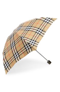 Rainy days don't stop the recognizable style of an iconic check umbrella and it's convenient handle-topped pouch. Includes umbrella and pouch Textile/metal Imported Burberry Umbrella, Cute Umbrellas, Umbrella Holder, Rainy Days, Burberry, Umbrella, Nordstrom, Pouch, Quick Saves