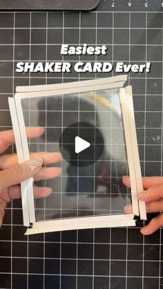 two hands are holding an empty shaker card over a tiled surface with the words easier shaker card ever