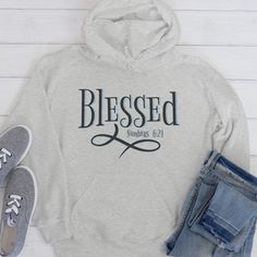 This hoodie features a unique print that reads "Blessed" as taken from Bible Verse Numbers 6:24. It is perfect for those looking to wear a reminder of faith and hope. With a unisex fit, this hoodie is a great choice for Christians of all genders. 50% cotton, 50% polyester Air jet yarn creates a smooth, low-pill surface Double needle stitching; Pouch pocket; Unisex sizing Care: Machine wash cold; Tumble dry low Print Method: DIGISOFT™ Size Chart Inspirational Letter Print Relaxed Fit Hoodie, Inspirational Letter Print Relaxed Hoodie, Inspirational Letter Print Hoodie For Fall, Christian Hoodies, I Love You God, Christian Post, Jesus Is Life, Bible Art Journaling, Faith Hope