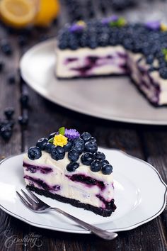 a slice of blueberry cheesecake on a plate