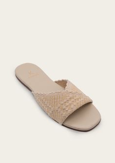 Upper: 100% Cotton Inner Sole: Leather Sole: Rubber Fit Comments: True to size Half sizes should size up if regular-width or size down if narrow width Paige Handwoven twisted Slide Sandal Beige Synthetic Slippers With Removable Insole, Beige Synthetic Sandals With Rubber Sole, Cream Sandals With Rubber Sole For Beach, Beige Slippers With Removable Insole For Vacation, Beige Vacation Slippers With Removable Insole, Beige Flat Slippers With Textured Sole, Beige Textured Footbed Slippers For Vacation, Beige Slip-on Sandals With Textured Sole, Comfortable Sandals With Textured Sole In Natural Color