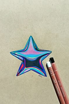 a drawing of a star and two crayons