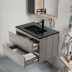 a bathroom vanity with drawers and a sink