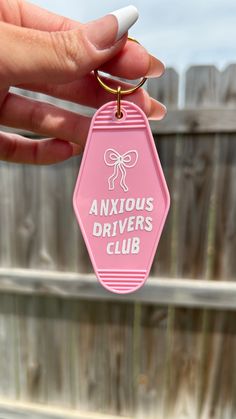 If you're an anxiety girly, you NEED this cutie pink keychain in your life! This motel keychain is the perfect addition to your key ring! Beep beep! Keychain is pink with premium vinyl "Anxious Drivers Club" design.  DETAILS: Width: 1.7in Length: 2.5in , 3.5in with keyring Includes key ring. Retro Motel Keychain, Pink Motel, Retro Motel, Keychain Pink, Motel Keychain, Pink Keychain, Girls Keychain, Car Hangers, Holiday Gift Card