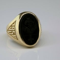 10K Yellow Gold 1950 School Ring, oval engraved black onyx plaque with cross and lamp, 5/8 inch across, bright polish, Ring size 5, Circa 1950, 7.5 grams SKU # BB272R24 Most rings are sizable for a small fee. If the ring you are considering is the incorrect size contact us for a quote. This listing contains photographs of the actual item you will receive. Our items are in excellent condition with little or no signs of wear and many are one of a kind pre-owned estate finds. Please look closely at 1950 School, 1920s Ring, School Rings, Ring Oval, Art Deco Diamond, Fine Jewelry Designers, Boston Ma, Pearl Ring, Pink Tourmaline