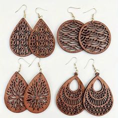 New In Original Packaging. Beautifully Carved Designs In Large Drop Earrings. Set Of Four Pair As Shown. Msrp $19.99 Usd Large Drop Earrings, Dangle Earrings Boho, Boho Style Earrings, Carved Designs, Wood Carved, Wooden Earrings, Wood Earrings, Wooden Jewelry, Style Earrings