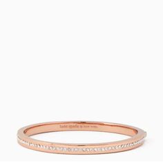 $78 Kate Spade Ring It Up Pave Bangle In Rose Gold Cubic Zirconia And Glass Stones Hinged Opening Weight: 25g Inner Circumference: 2.25" Width: 2.1" Kate Spade Brings The Glam With This Pav Lined Bangle Bracelet. Logo Engraved At The Interior. Crafted In Gunmetal Silver-Tone Mixed Metal. Item Is In Brand New, Unworn Condition. This Item Is New With Kate Spade Dust Bag. Authentication This Item Has Been Evaluated For Authenticity. Photos Are Included Of The Actual Product. Many Of The Items Come Kate Spade Elegant Bangle Jewelry, Bracelet Logo, Pave Bangle, Kate Spade Jewelry, Rose Gold Color, Mixed Metals, Bangle Bracelet, Womens Jewelry Bracelets, Bangle Bracelets