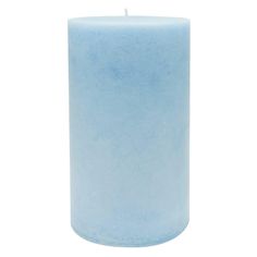 a blue pillar candle on a white background