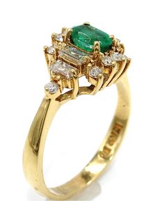 Vintage 18K yellow gold ring with one oval emerald 0.56 carats. 4 baguette diamonds and 10 round diamonds totaling 0.80 carats. (Created circa 1985) Emerald Ring With Diamonds, Vintage Emerald Ring, Emerald Ring Vintage, Future Engagement Rings, Baguette Diamonds, 18k Yellow Gold Ring, Yellow Gold Ring, Baguette Diamond, Emerald Ring