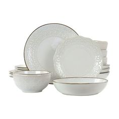 white dinnerware set with gold trimmings