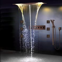 an open shower head with water running from it's sides and lights on the side