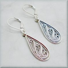 "Beautiful filigree teardrops dance at the end of simple leverback earrings. These earrings are lightweight and easy to wear. The design goes easily from day to night for added versatility. The earrings are 1 1/2\" long (3.8 cm) from the top of the earwire to the bottom of the dangle. Both teardrops and leverbacks are sterling silver. Items are shown larger in pictures to show detail - please note the dimensions. Jewelry is packaged in a cotton lined gift box. See more Bonny Jewelry at http://bo Sterling Silver Filigree Teardrop Earrings, Dainty Teardrop French Hook Earrings, Dainty Teardrop Earrings With Lever Back, Teardrop Pendant Earrings With French Hook For Gift, Teardrop Earrings With French Hook For Gift, Delicate Silver Teardrop Earrings, Teardrop Earrings With French Hook As Gift, Gift Teardrop Earrings With French Hook, Silver Items