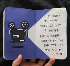 someone is holding up a book with an image of a film camera on it and the words i know this is not a movie, but i keep hoping in the end