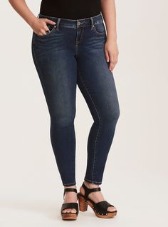 Everyone has a go-to pair of jeans; the first pair that you reach for every morning when you're putting together a casual cute look. With a sleek silhouette, these skinny jeans are a versatile go-to with a medium wash denim that has been whiskered, creased and gently faded for a casually chic look. With a skinny-mini fit from thigh to ankle and wiggle room at the hem.    Mid-rise  Size 18: 13" leg opening  Ex-Short 26", Short 28", Regular 30", Tall 32", Ex-Tall 3... New Street Style, All Jeans, Active Outfits, New Pant, Jean Top, List Style, Plus Size Jeans, Softest Sweater, Pocket Design