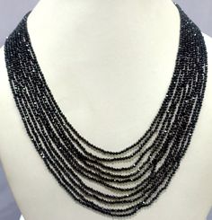 Black Spinel Necklace, Natural Black Spinel 2mm Rondelle Faceted Beaded Jewelry Necklace, Black Spinel 10 Strand Jewelry Necklace Gemstone :- Black Spinel Size :- 2mm Approx Strand :- 10 Strand Shape :- Rondelle Faceted Color :- Black Quality :- AAA GRADE https://www.etsy.com/in-en/shop/LatestBeadsJewellery?ref=simple-shop-header-name&listing_id=720939504 Your Feedback is very Important for us. If you have any problem regarding packaging or product, kindly contact us to resolve the issue bef Black Multi-strand Necklace With Faceted Beads, Elegant Black Rondelle Beaded Necklaces, Elegant Black Faceted Beads, Black Faceted Beaded Necklaces For Party, Black Rondelle Gemstone Beaded Necklace, Black Rondelle Gemstone Bead Necklace, Black Rondelle Beaded Necklaces, Black Faceted Round Beaded Necklaces, Black Faceted Beaded Necklaces