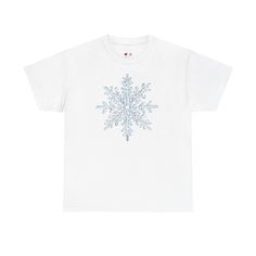 A classic unisex T-Shirt featuring a print of a big ice blue snowflake on the chest. This T-Shirt gives off a cozy winter vibe and is perfect for the holiday season. It is relevant to anyone looking for a casual and comfortable shirt for everyday wear or festive occasions. Product features - Shoulder tape for added stability and prevent stretching - Made from medium fabric of 100% durable cotton - Ribbed knit collar without seam for shape retention - Tear-away label for scratch-free experience - Snowflake Shirt, Winter Tees, Blue Winter, Blue Snowflakes, Ice Blue, Halloween Shopping, Heavy Cotton, Cotton Shirt, Unisex T Shirt