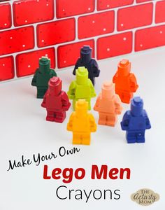 lego men are sitting in front of a brick wall with the words make your own lego men crayons