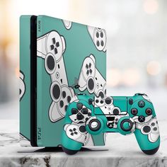 a video game console and controller sitting on top of a marble table with an abstract background