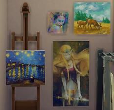 there are paintings on the wall next to easel