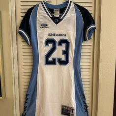 This Is A Limited Edition North Carolina Tar Heels Jordan Jersey Dress In Excellent Condition. It Is So Stylish It Has A Lace Up On Both Sides, This Would Be So Cute Worn To A Game, Or Even A Watch Party At Home! The Size Is Large, But Runs Small. Jordan Jersey Dress, Jordan Jersey, Party At Home, North Carolina Tar Heels, Watch Party, Tar Heels, Jersey Dress, North Carolina, So Cute