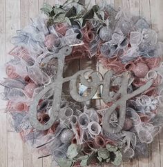 a wreath with the word joy on it