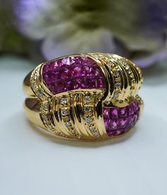 This luxurious estate ring is crafted in highly desirable 18K yellow gold. It is a very high quality designer piece signed (see picture). So well made!! There are 34 genuine earth mined French square cut rubies, grand total ruby weight is estimated to be 1.50 carats. They have a luscious red color with a very strong brilliance!! To finish off this fascinating piece there are 38 brilliant round cut diamonds that are estimated to be very clean SI-1 in clarity and HI in color (colorless). Grand tot Luxury Multi-stone Ruby Ring In Gold, Luxury Gold Ruby Ring With Multi-stone, Luxury Multi-stone Gold Ruby Ring, Luxury Baguette-cut Ruby Ring In Yellow Gold, Luxury Yellow Gold Ruby Ring For Anniversary, Luxury Yellow Gold Ruby Ring With Diamond Accents, Luxury Ruby Ring With Diamond Accents In Yellow Gold, Luxury Gold Ruby Ring With Diamond Accents, Diamond Chain Necklace