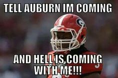 a football player with the words tell auburn i'm coming and hell is coming with me