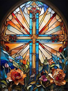 a stained glass window with flowers and a cross in the center, on a black background