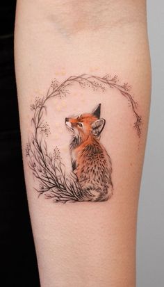 a small fox tattoo on the right thigh