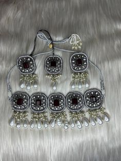 *100% Handmade jewelry. The base Metal color is grey tone with kundan, ad along with natural beads. *Adjustable choker comes with beautiful earrings and tikka. *It will be give you a unique and beautiful look. *very unique and beautiful  color combination. *We have High quitly jeweley. *If you have any question feel free to contact me. *keep jewelry safe, dirt free, dust free, away from water, perfumes and other harsh chemicals.  *Thank you for visiting on AngelsDesignz Traditional Silver Beaded Kundan Necklace, Festive Silver Beaded Jewelry Sets, Festive Beaded Silver Jewelry Sets, Bohemian Silver Kundan Necklace With Stone Work, Silver Kundan Beaded Necklace, Silver Stone Work Choker Jewelry Sets, Silver Choker Jewelry Sets With Stone Work, Silver Bollywood Choker With Hand Set Detail, Silver Bollywood Style Choker With Hand Set Details