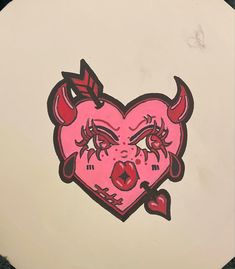 a drawing of a pink heart with horns on it