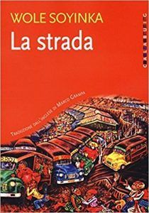 a book cover with an image of cars and people in the background, on red paper