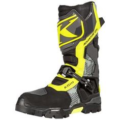 a pair of yellow and black motorcycle boots