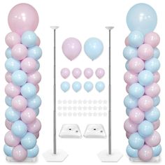 the balloon arch is decorated with pastel blue and pink balloons