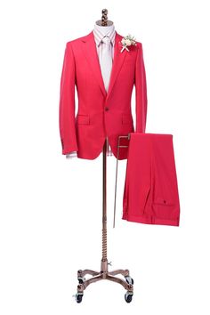 Red Coral Custom Wedding Suit Look your best and feel confident on your wedding day in this stunning custom red wedding suit. This suit is made with a high-quality red wool fabric and features a single-breasted design with notch lapels. The red color is both stylish and versatile, making it the perfect choice for any wedding. Some people might call it red colored, and others might call it coral colored. But no matter what you call it, this suit is sure to turn heads on your wedding day. Imagine yourself walking down the aisle in this stunning suit. Your bride will be stunned, and your guests will be amazed. You'll look and feel like a million bucks in this custom suit. Features: Red wool fabric Full lining Single-breasted jacket with notch lapels Horn buttons Customize it: All of our cloth Red Fitted Suit For Groom, Fitted Red Suit For Groom, Classic Red Suits For Groom, Classic Red Suit For Groom, Red Tuxedo Style Three-piece Suit For Groom, Classic Red Three-piece Suit For Groom, Red Three-piece Suit With Notch Lapel For Groom, Red Notch Lapel Suits For Groom, Red Notch Lapel Suits For Grooms