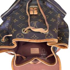 This pre-owned Louis Vuitton Bosphore Backpack is named after the Bosphorus Strait, which separates the continents of Europe and Asia in Istanbul, Turkey. This iconic backpack, crafted in Louis Vuitton's signature Monogram canvas, blends practicality with luxury, featuring multiple pockets and a spacious interior, making it a favorite among travelers and fashion enthusiasts alike. Brown monogram coated canvas backpack Natural leather trim, handle, and drawstring. Adjustable canvas shoulder strap Luxury Coated Canvas Leather Backpack For Daily Use, Luxury Coated Canvas Backpack For Daily Use, Luxury Coated Canvas Leather Backpack, Designer Backpack In Signature Coated Canvas For Everyday Use, Designer Monogram Canvas Backpack, Luxury Coated Canvas Backpack, Luxury Leather Coated Canvas Backpack For Travel, Designer Backpack In Signature Coated Canvas, Signature Coated Canvas Travel Backpack