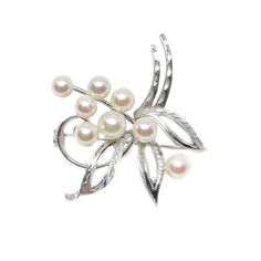 "This is a stunning vintage art nouveau style floral engraved Japanese akoya saltwater cultured pearl brooch with diamond cut leaves. The pearls measure between 5.00-6.50mm. They have sharp luster with bright rosy overtones. It is made of solid sterling silver and has a unique design. It measures 1 1/2 inches long. Stamped \"SILVER\". Japan 1950's-1960's. All pearls are truly vintage and have only been lightly cleaned." Formal Silver Pearl Brooch, Silver Pearl Brooch For Anniversary, Elegant Silver Pearl Brooches, Saltwater Pearls, Art Nouveau Style, Pearl Brooch, Pearl Strands, Akoya Pearls, Silver Brooch