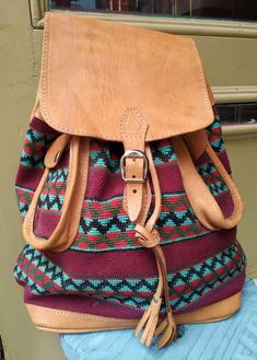 "Welcome! Amazing Vintage Leather and fabric Backpack In very good condition, i think never use A lot of pockets Measures: H: 14.56\" (37 cm) W: 13.77\" (35 cm) Deep: 3.54\" (9 cm) Thanks for stopping by!!IMPORTANT: Due to the delicate situation We're all going through, and in order to keep the safety of courier workers too, all orders will be dispatched when alert sanitary finished. You can purchased or reserve items like always. Thanks so much for your understanding." Vintage Standard Backpack For Trips, Vintage Leather Backpack For Trips, Vintage Satchel Backpack For Trip, Vintage Backpack For Travel, Vintage Backpack For Trips, Vintage Satchel With Leather Handles In Backpack Style, Casual Travel Satchel With Leather Backing, Casual Leather-backed Satchel For Travel, Vintage Brown Backpack For Trip