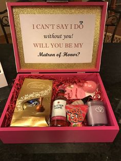 a pink box filled with lots of different items