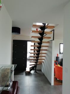 there is a spiral staircase in the living room