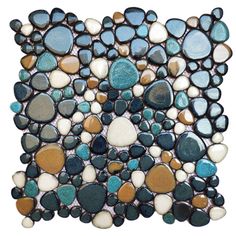 a mosaic tile with various colors and shapes