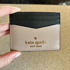 New With Tag, Just A Bit Too Small For Me, Was Final Sale 3.0" H X 3.9" W Saffiano Leather Ksny Metal Pinmount Logo Two Way Spade Jacquard Lining Exterior: 6 Credit Card Slots, Open Middle Compartment Imported Kate Spade Beige Wallet, Everyday Beige Kate Spade Wallet, Kate Spade Card Holder For Everyday Use, Trendy Kate Spade Wallet With Card Slots, Trendy Kate Spade Wallets With Card Slots, Kate Spade Lanyard, Black Spades, Horse Keychain, Kate Spade Disney