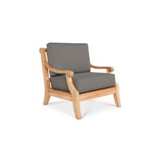 a wooden chair with grey cushions on it's back and armrests, in front of a white background